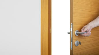 Hand Holding Door Handle Front View