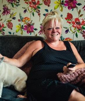 Resident And Pet On Sofa