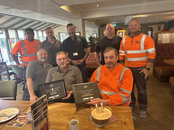 Steve and Derek celebrate over 40 years service